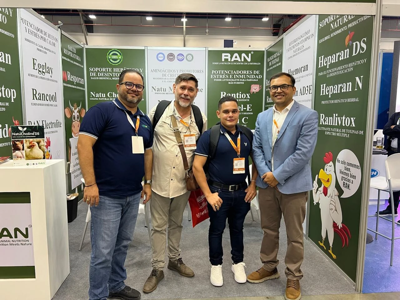 Group of visitors at the RAN booth